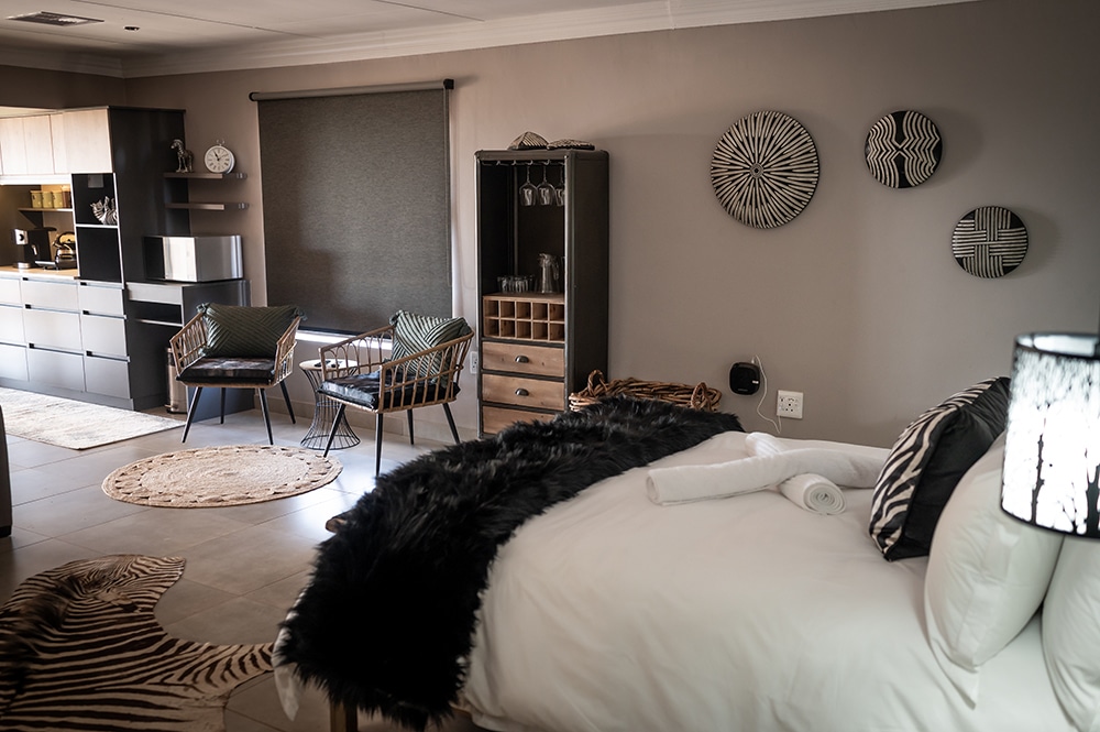 Interior of a luxury safari lodge room at Shalom Boutique Lodge & Hunting Safaris