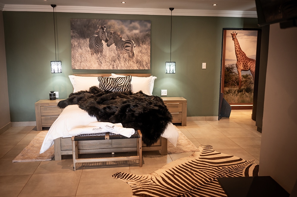 Interior of a luxury safari lodge room at Shalom Boutique Lodge & Hunting Safaris