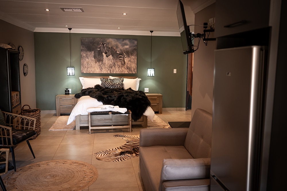 Interior of a luxury safari lodge room at Shalom Boutique Lodge & Hunting Safaris