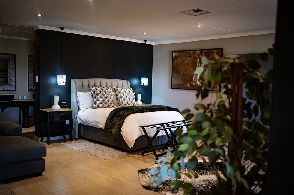Interior of a luxury safari lodge room at Shalom Boutique Lodge & Hunting Safaris
